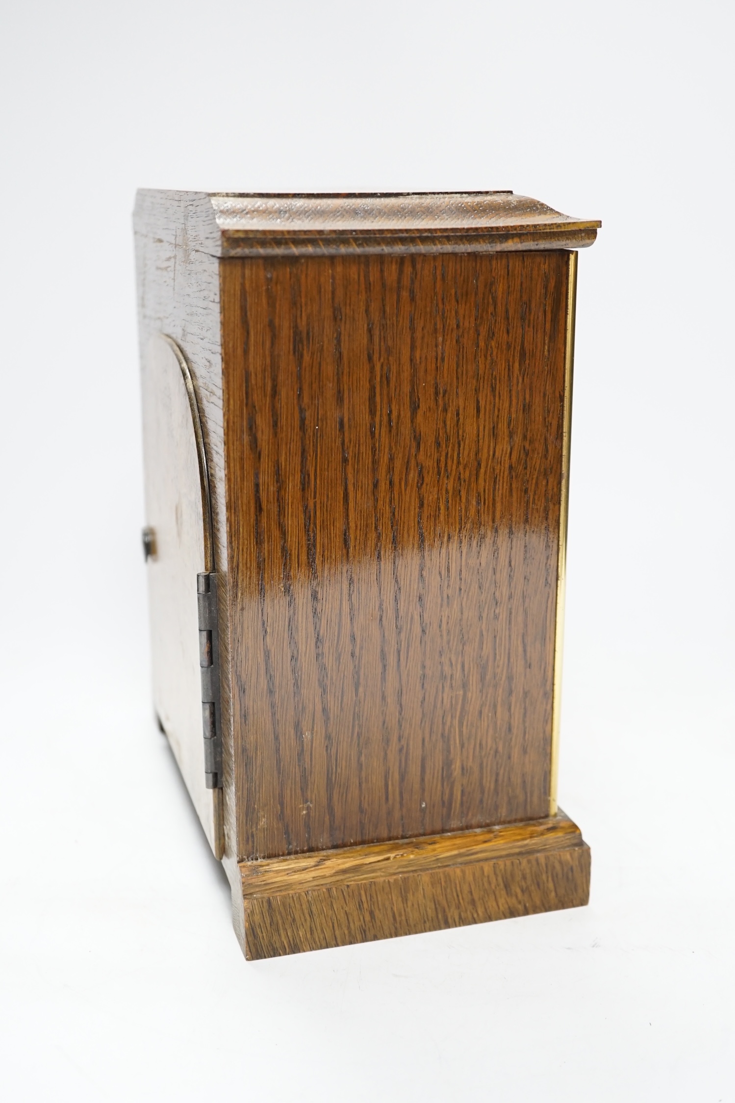 An Elliott three train mantel clock, 25cm high